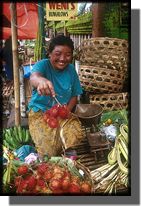 Picture of lady in fruit market Bali Indonesia