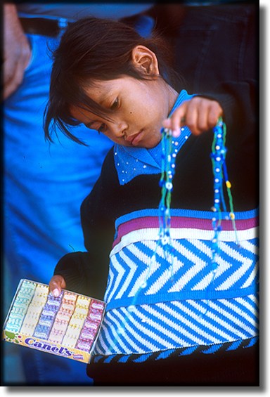 Photograph of, Ensenada Mexico, street vendor, child selling chicklets